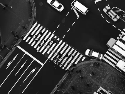 City scene with cars and street.