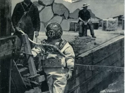 Postcard - Diver about to descend into Detroit River near Bois Blanc Island, Str. Britania approaching.