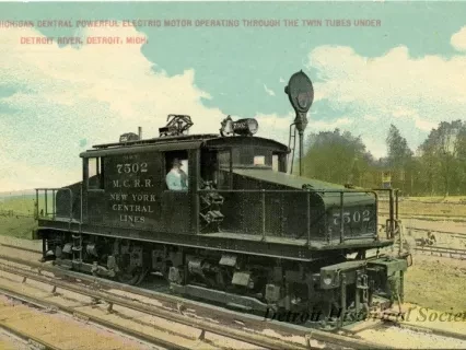 Postcard - Michigan Central Powerful Electric Motor Operating Through the Twin Tubes Under Detroit River, Detroit, Mich.