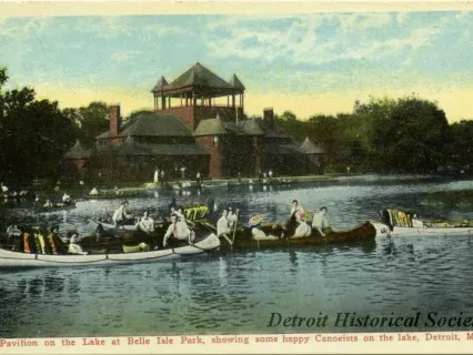 Postcard - The Pavilion on the Lake at Belle Isle Park, showing some happy Canoeists on the lake, Detroit, Mich.