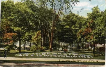 Postcard - Grand Circus Park, - Floral Piece: "In Detroit, Life is Worth Living."