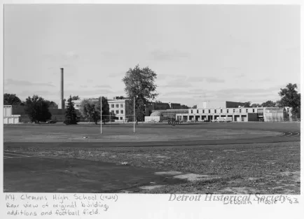 Print, Photographic - Mt. Clemens High School (1924), Rear view of original building, additions and football field