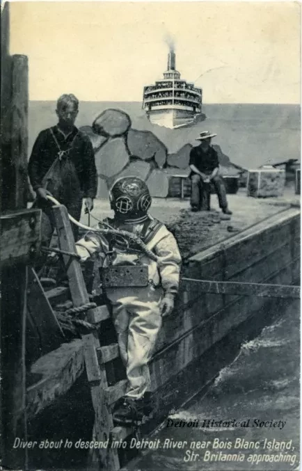 Postcard - Diver about to descend into Detroit River near Bois Blanc Island, Str. Britania approaching.