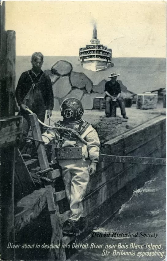 Postcard - Diver about to descend into Detroit River near Bois Blanc Island, Str. Britania approaching.