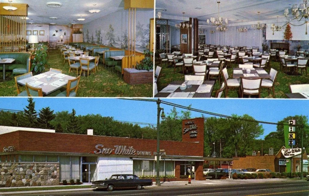 Vintage postcard showing restaurant interior with green carpet and chandeliers, and exterior with retro signage and cars.