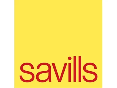 Savills logo with red text on a yellow background.